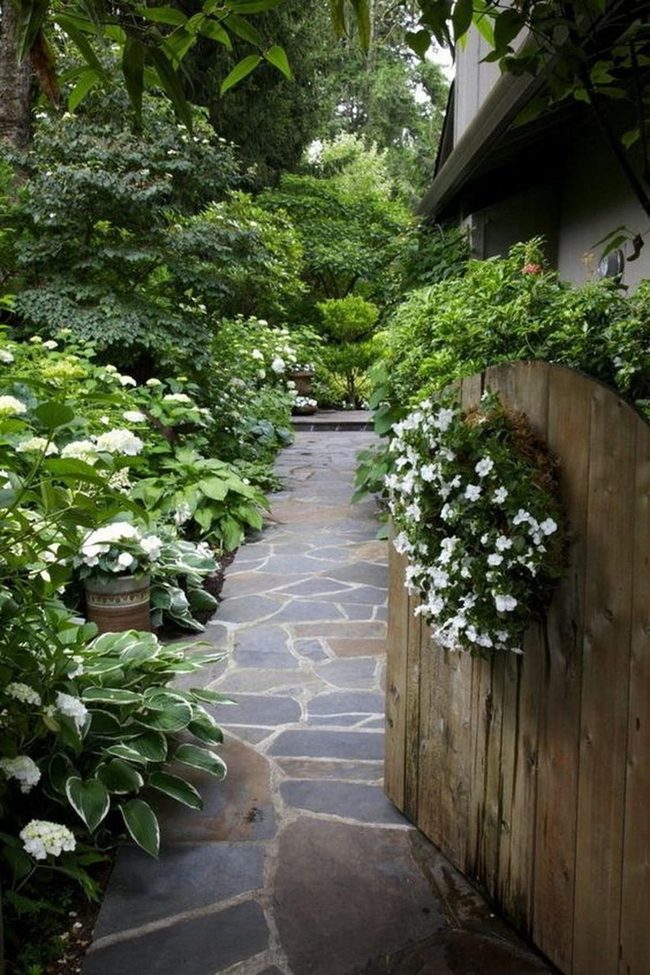 Stone Path Through Layered Blooms