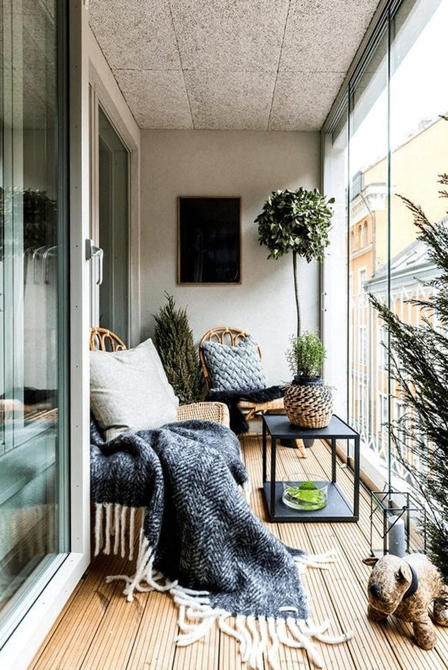 Light Wood Balcony With Abundant Plants