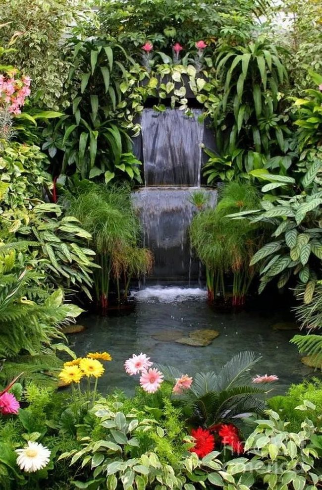Blooming Pond Garden With Cascading Water