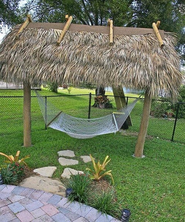 Thatched Hammock Nestled In Stone