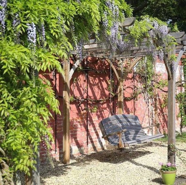 Suspended Wood Bench Under Pergola