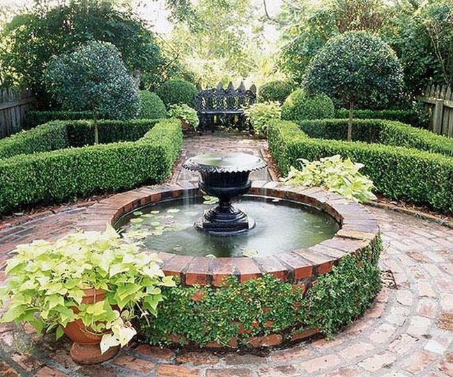 Stone Urn Fountain With Lily Pond