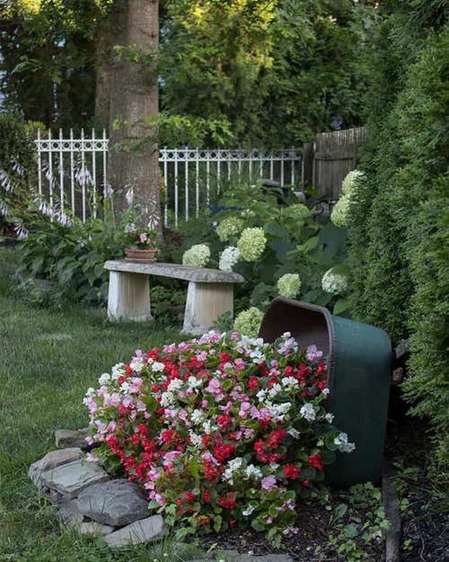 Overturned Tubs Spilling Cascading Blooms