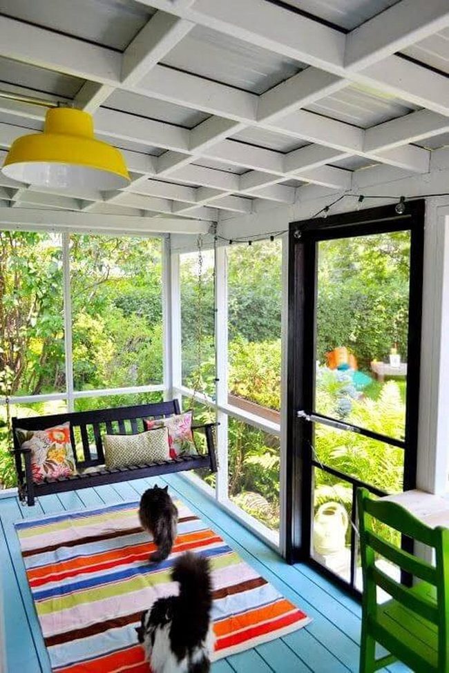 Bright Yellow Light Over Striped Porch