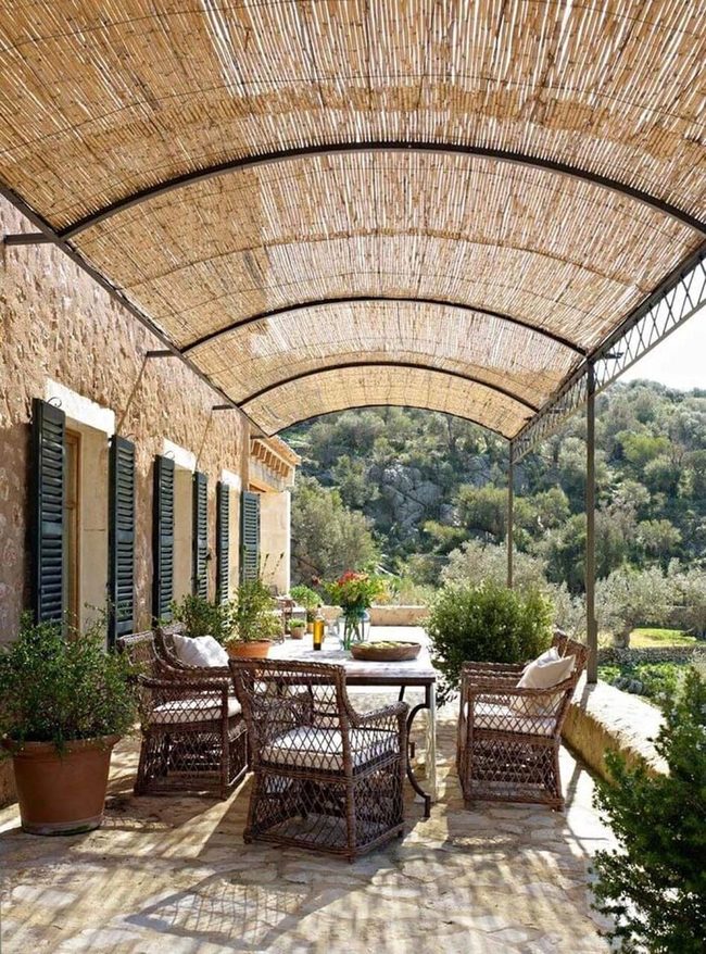 Iron Arch With Thatch Roof