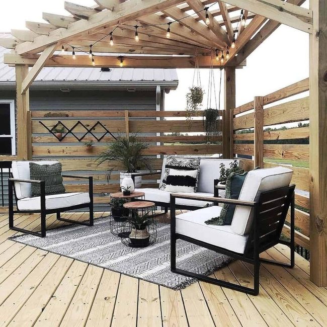 Stained Wood Deck With Glowing String Lights