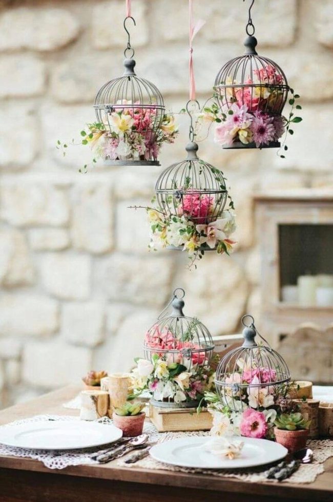 Vintage Birdcage Bursting With Blooms