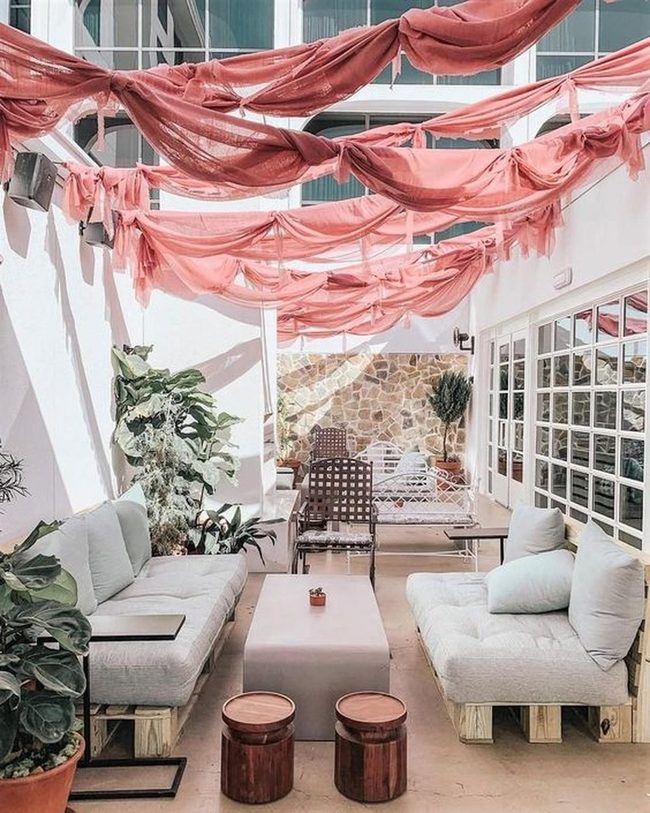 Pink Canopy Patio With Stone Walls