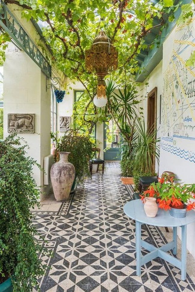 Green Vines Embrace Vintage Chandelier