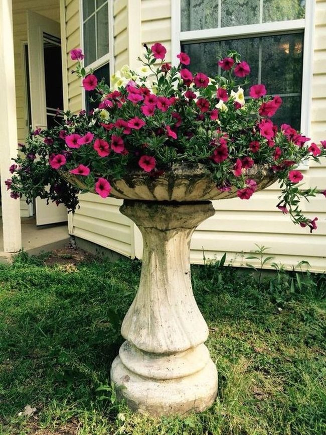 Stone Pedestal Cascading Flower Container