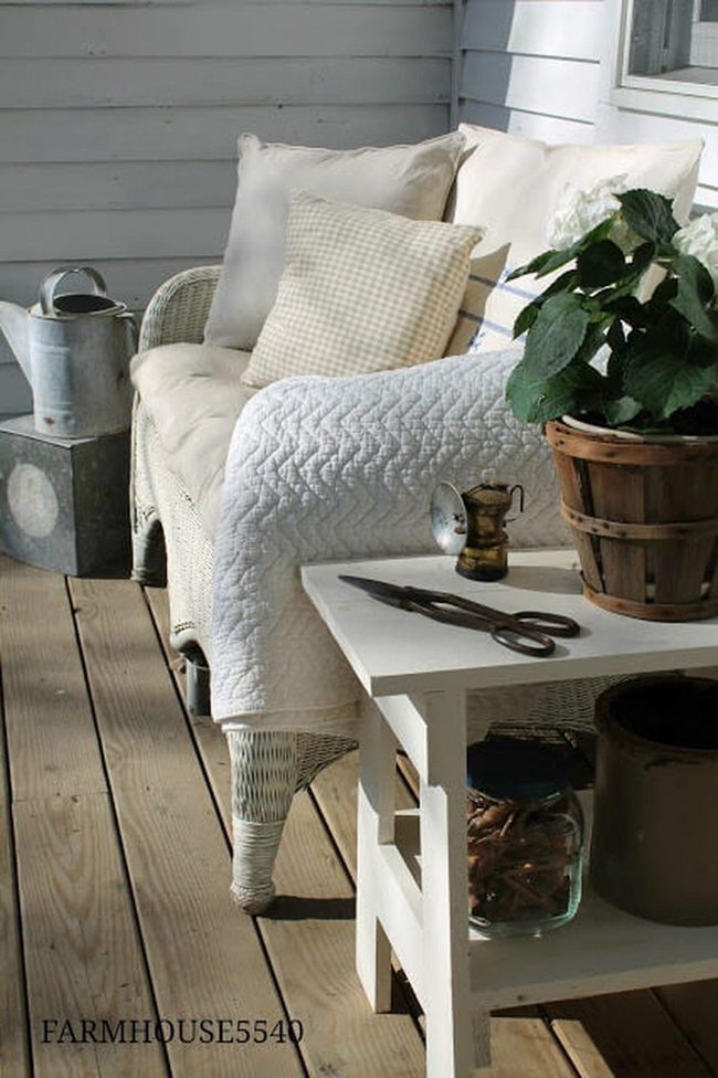 Blooming Garden With White Storage Bench
