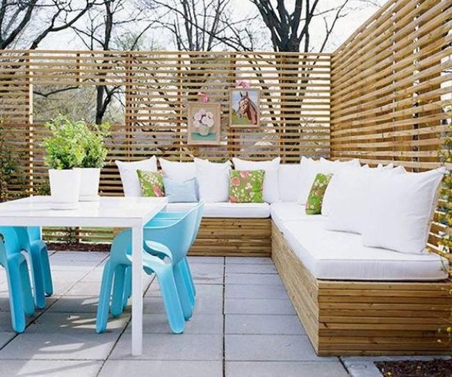 Blue Chairs, Wooden Slats, Green Views