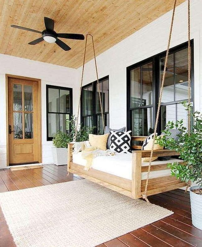 Hanging Sofa With Botanical Surrounds
