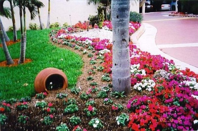 Overturned Pots Cascading Purple Blooms