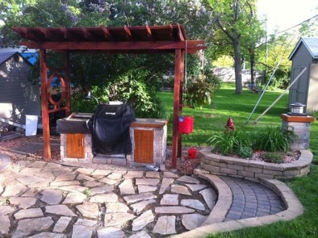 Stone And Wood Outdoor Cooking Space