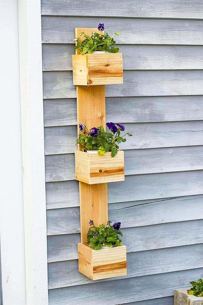 Stacked Wood Boxes Bursting Pansies