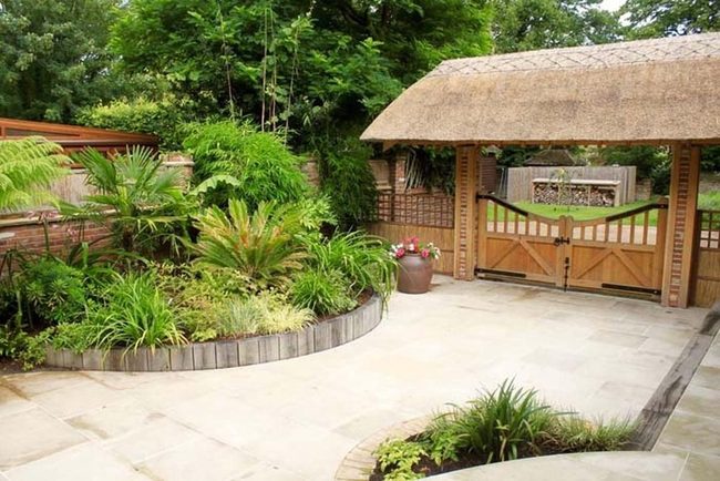 Natural Wood Garden Edging With Stone