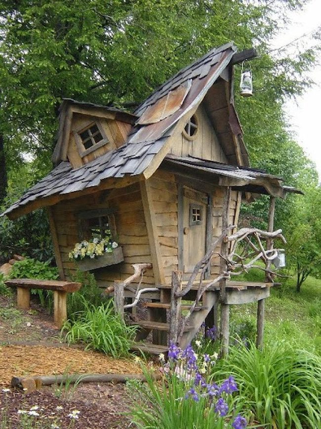 Storybook Cottage With Colorful Flowers