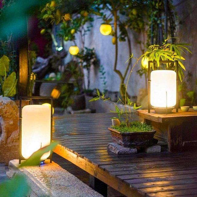 Yellow Lanterns Illuminate Wooden Garden Retreat