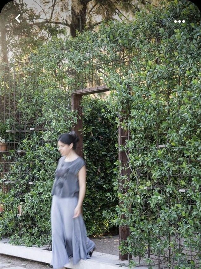 Ivy-Covered Gateway Through Living Walls