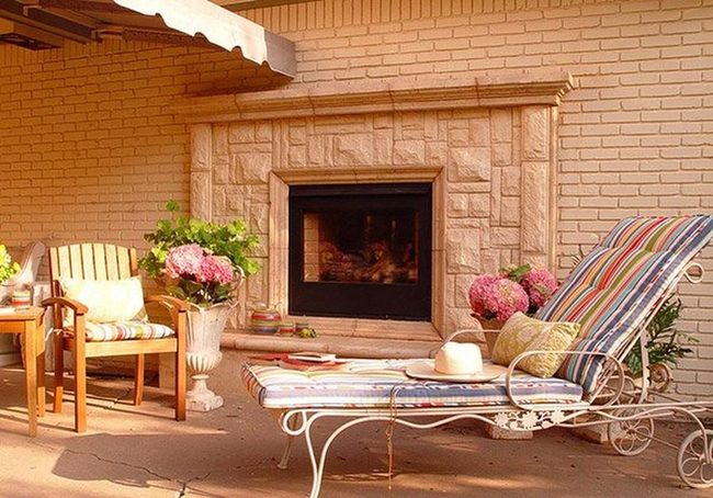 Stone Fireplace Meets Flower Gardens
