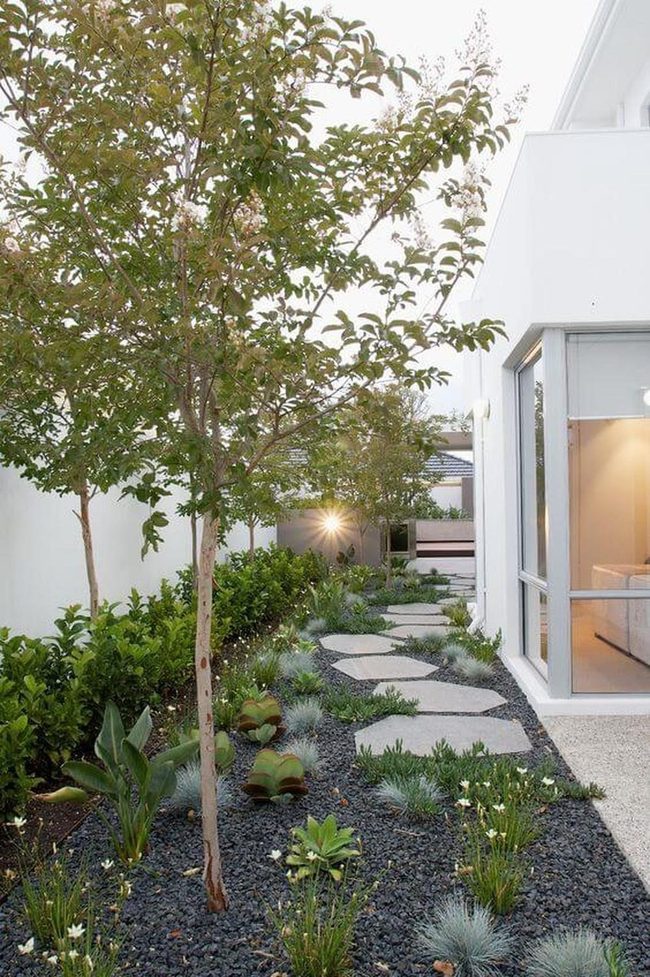 White Walls Gray Gravel Garden Path