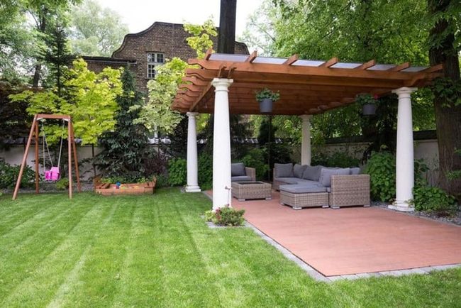 Wooden Pergola Meets Stone Architecture