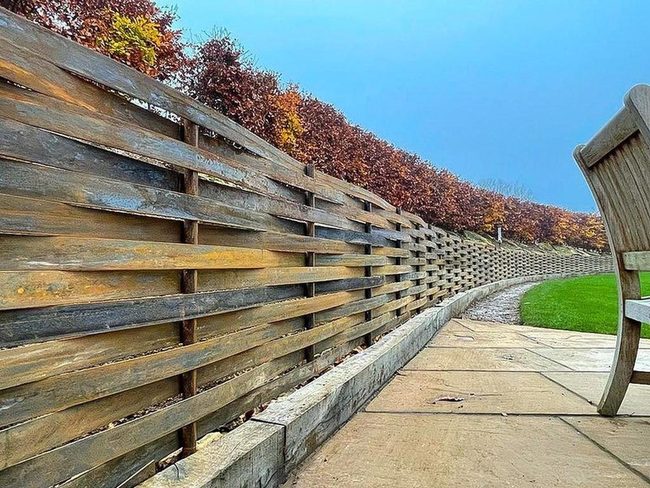 Natural Wood Fencing For Sloped Terrain