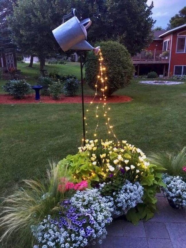 Silver Watering Can Light Installation