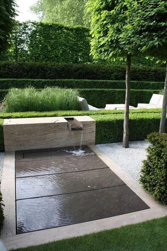 Stone Water Feature Anchors Modern Garden