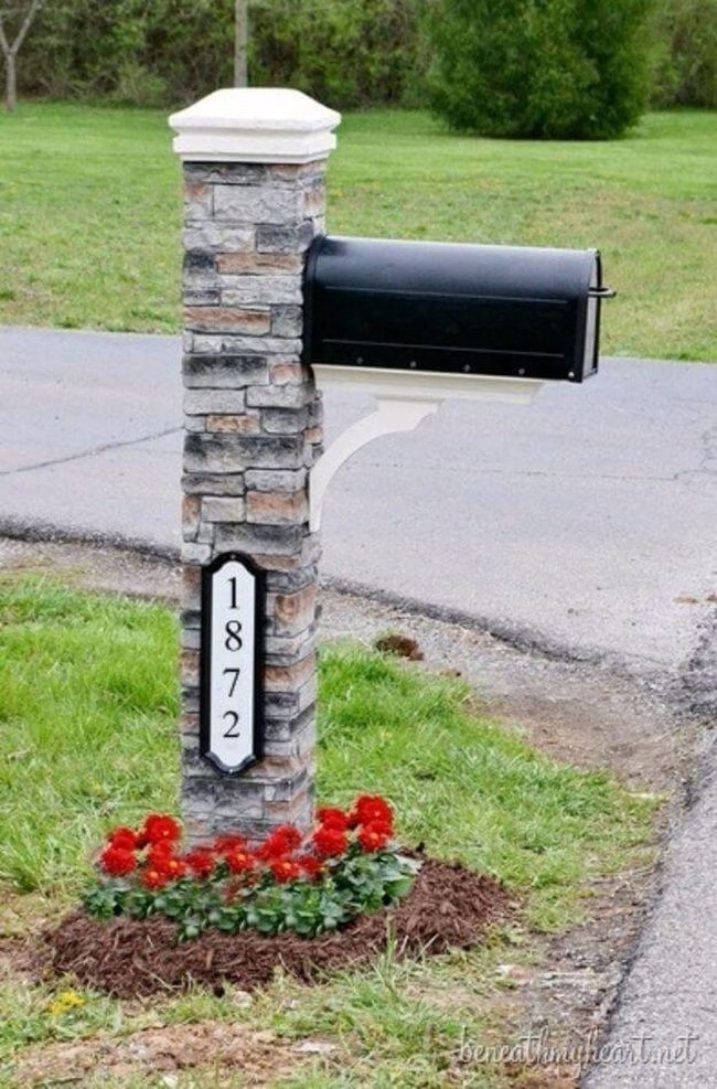 Stone Post With Scarlet Blooms