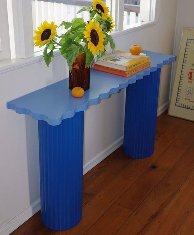 Sunflowers In Blue Wavy Vase