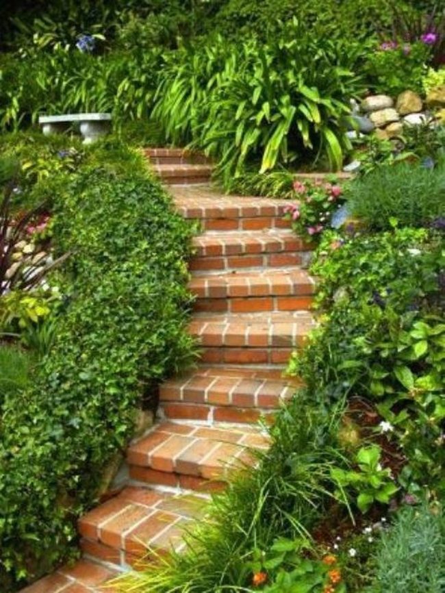 Brick Pathway Through Blooming Garden