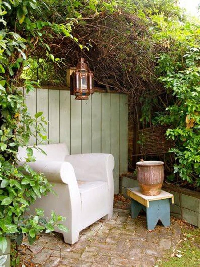 White Garden Seating Under Lantern
