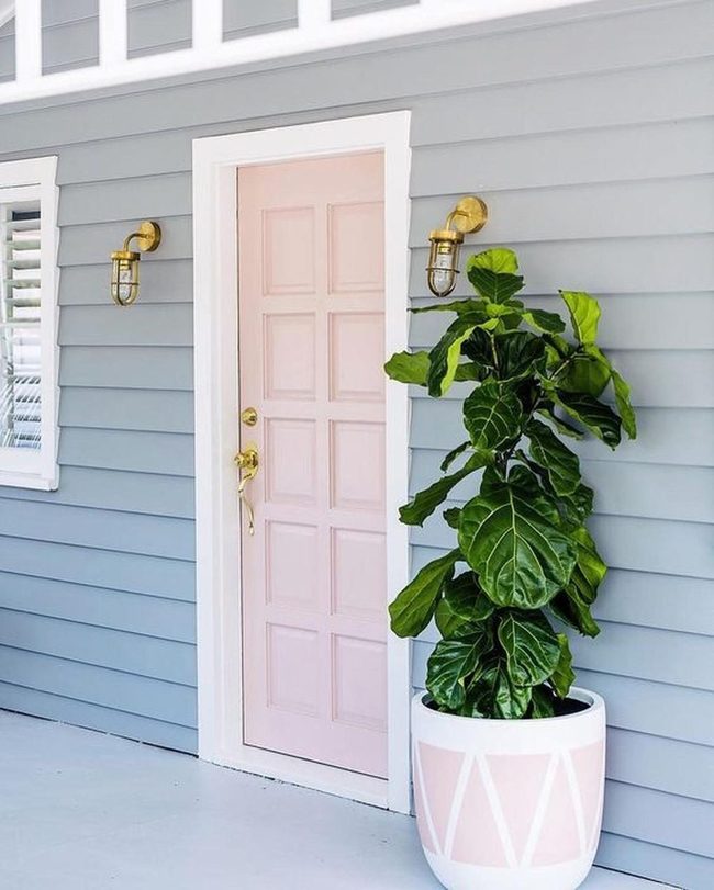 Pink Door With Coastal Blue Siding