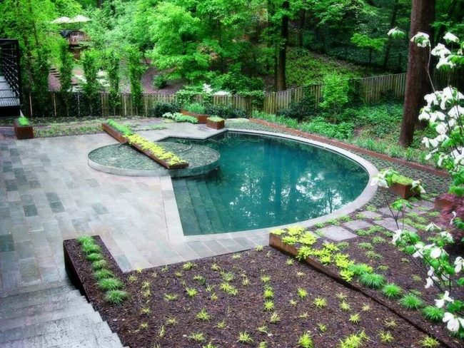 Curved Pool Where Stone Meets Garden