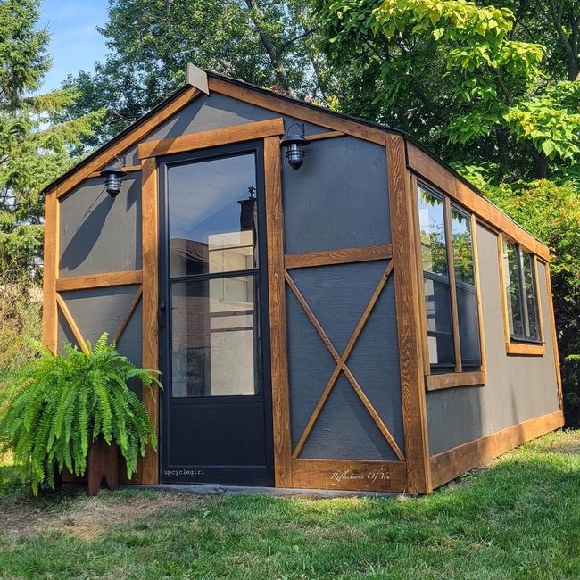 Black Studio Among Green