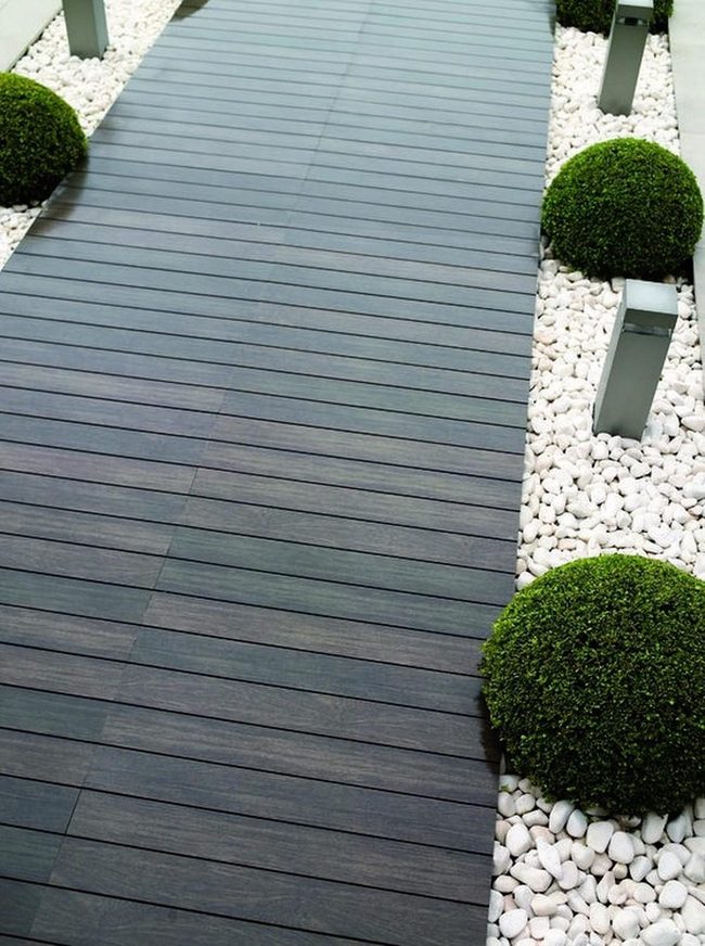 Wooden Planks White Pebbles Garden