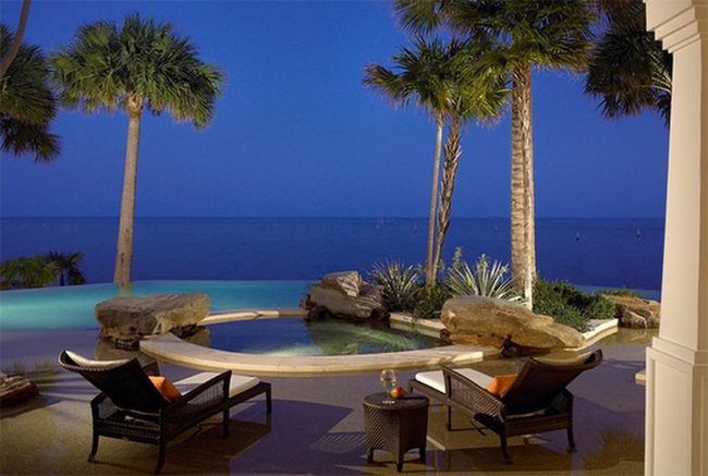 Sunset Blue Water, Palm Trees, Orange Lounges