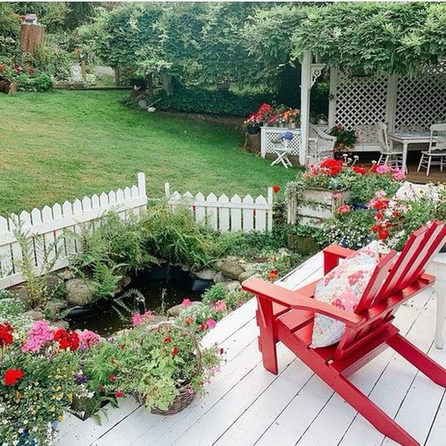 Crimson Chair Among Blooms
