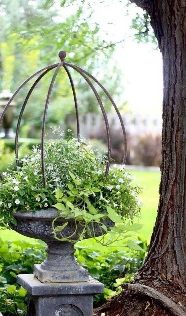 Metal Trellis With Cascading White Flowers