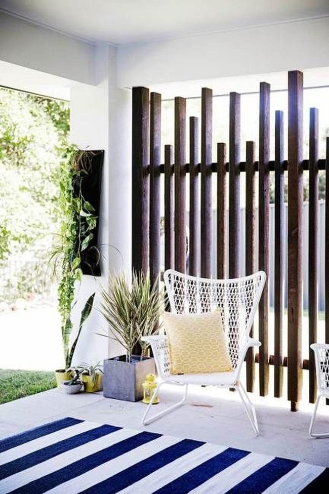 Sunlit Wood Slats And Greenery