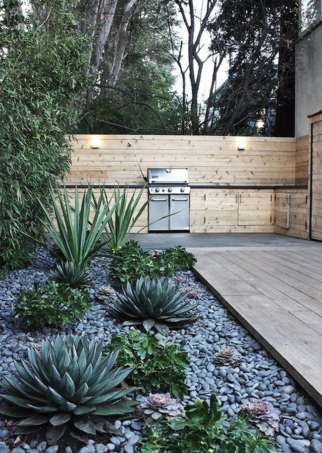 Gray Stone Garden Meets Wooden Deck