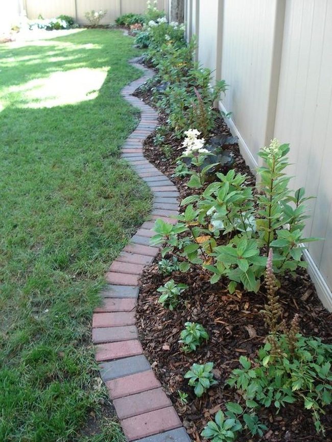 Green Beds, Brick Paths, White Blooms