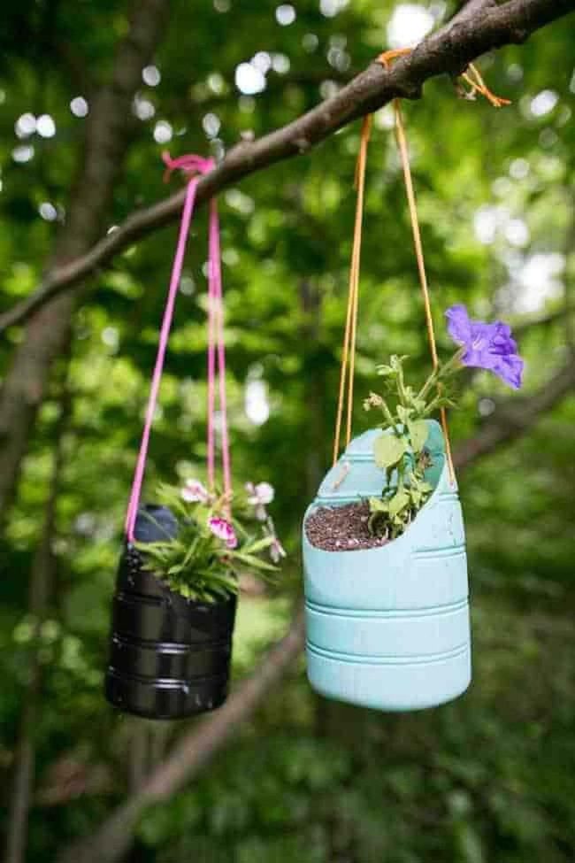 Painted Bottles Into Colorful Planters