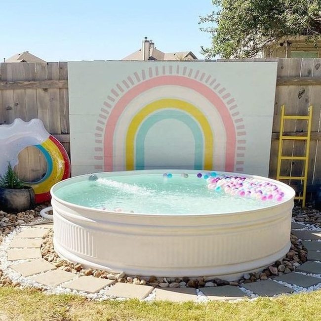 Pastel Rainbow Wall And Yellow Ladder Oasis