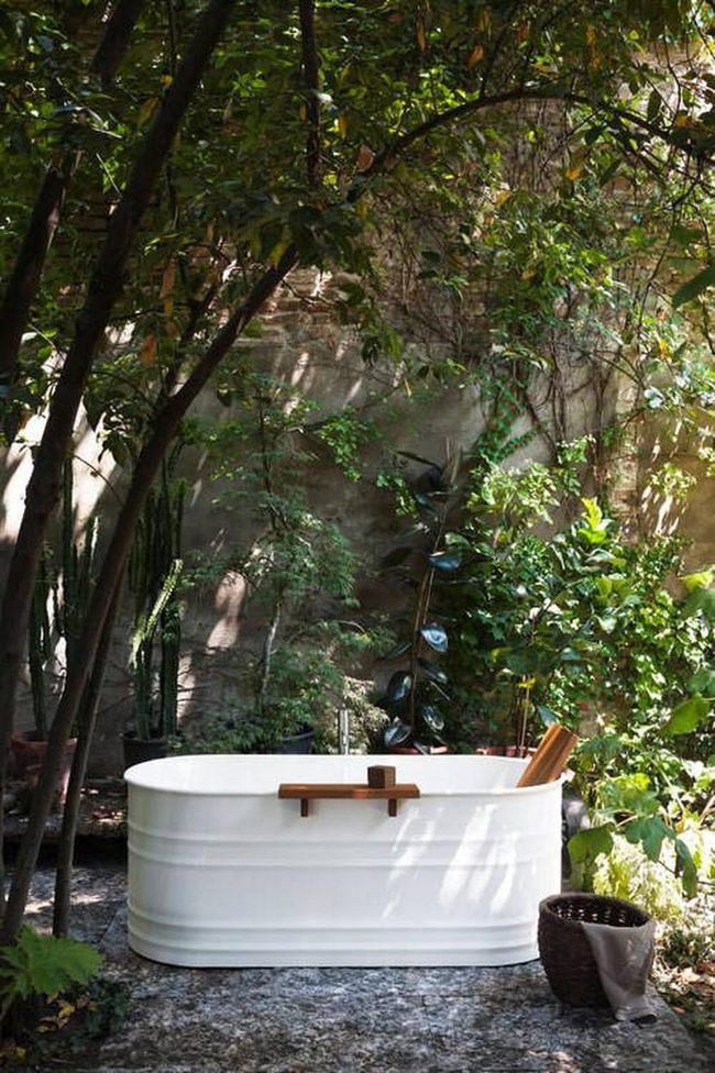 White Hot Tub Nestled In Green