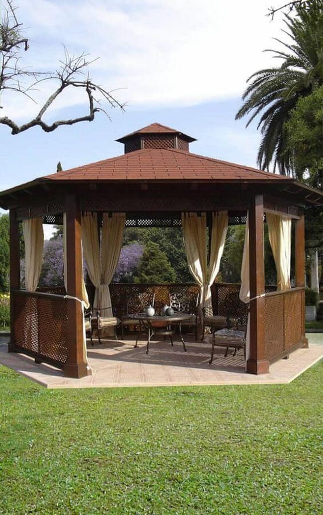 Wooden Pavilion With Flowing Fabric Canopy