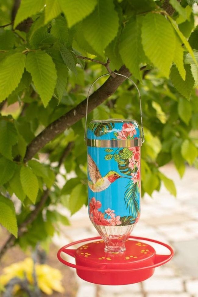 Blue Hummingbird Feeders With Pink Flowers