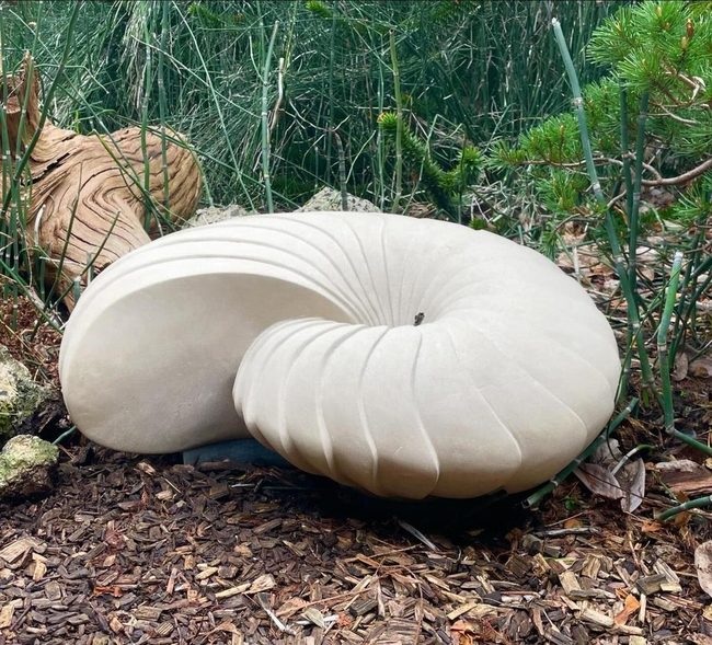 Flowing Stone Forms Garden Focal Point
